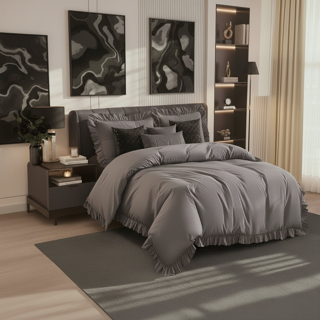 Modern bedroom with gray bedding, nightstands, and abstract wall art.